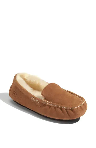 UGG Australia 'Ansley' Slipper ($99) - Your mom is bound to catch a case of happy feet in these soft and remarkably durable moccasin slippers. The sturdy sole also makes this the perfect pair of kicks for both indoor and outdoor wear.  (Photo: Ugg)