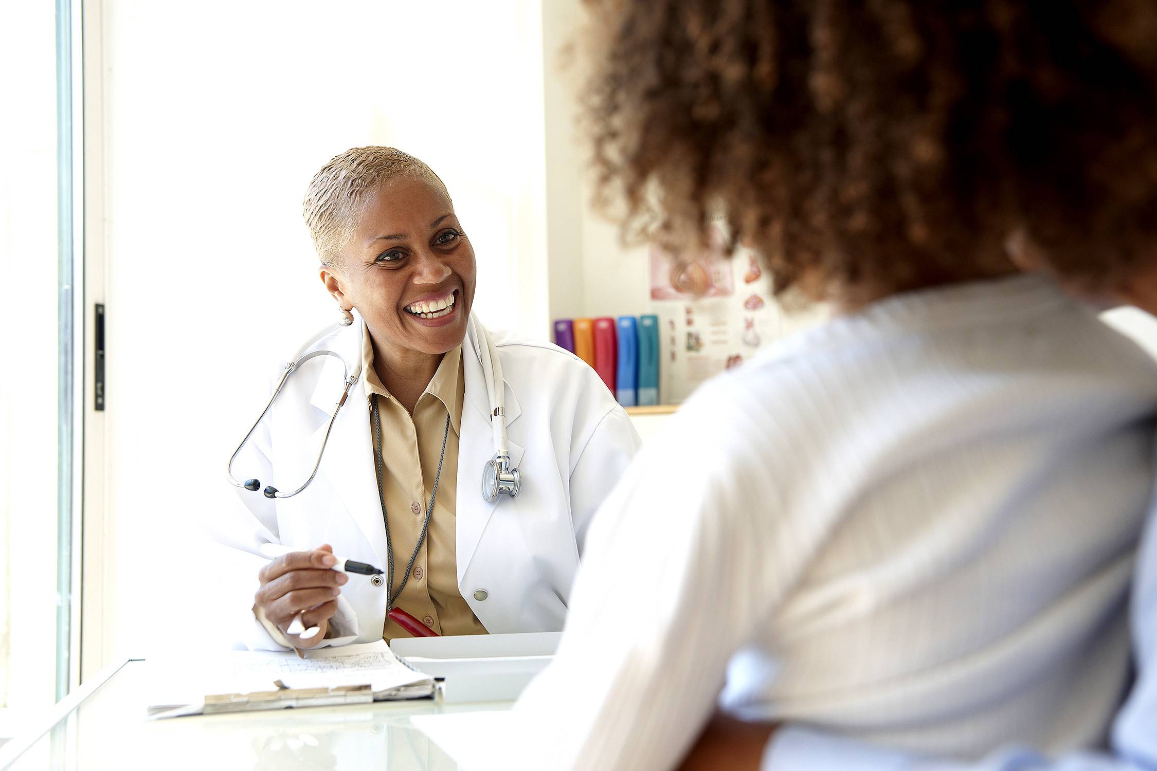 woman visiting doctor