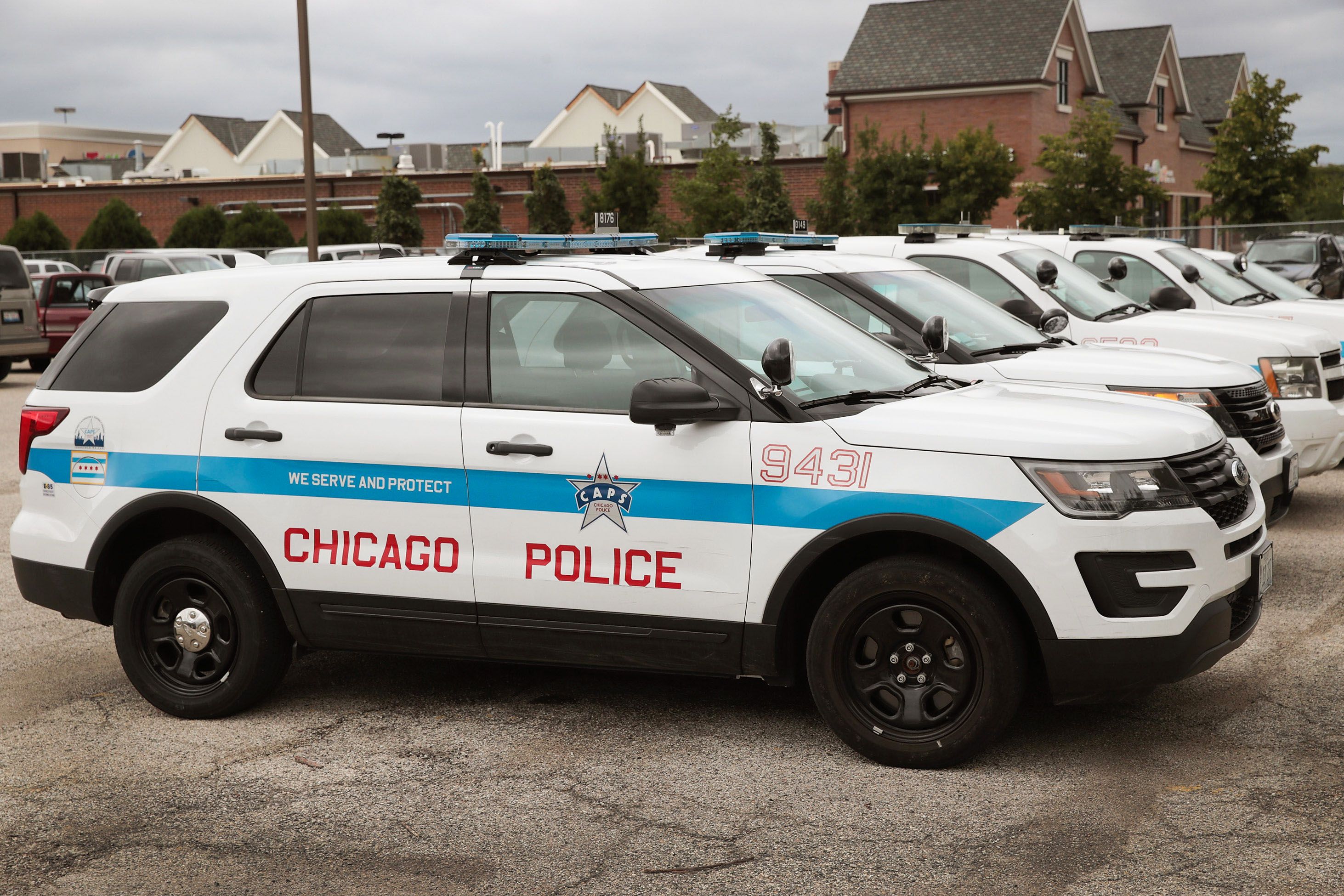 CHICAGO, IL - AUGUST 04:  Ford Explorer based Police Interceptors sit in a police station parking lot on August 4, 2017 in Chicago, Illinois. Police departments are beginning to take the SUVs out of service because the say fumes from the exhaust system are seeping into the SUVs passenger compartment and making officers sick. Ford claims 61% market share for sales to law enforcement agencies with its Explorer SUV and Taurus sedan police vehicles.  (Photo by Scott Olson/Getty Images)