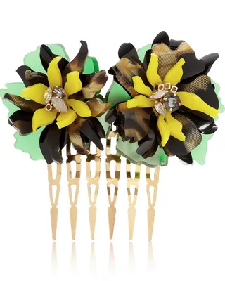 VickiSarge + Sam McNight Floramorta Hair Comb  - Stick this bright acetate and glistening Swarovski hairpiece into a low chignon or use it to decorate cascading curls.  (Photo: Net-A-Porter)&nbsp;
