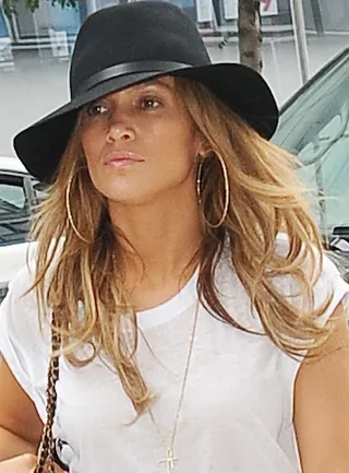 Jennifer Lopez  - J.Lo’s serving summertime fine with this sun-kissed skin and these dirty blonde strands.  (Photo: JDH Imagez / Splash News)