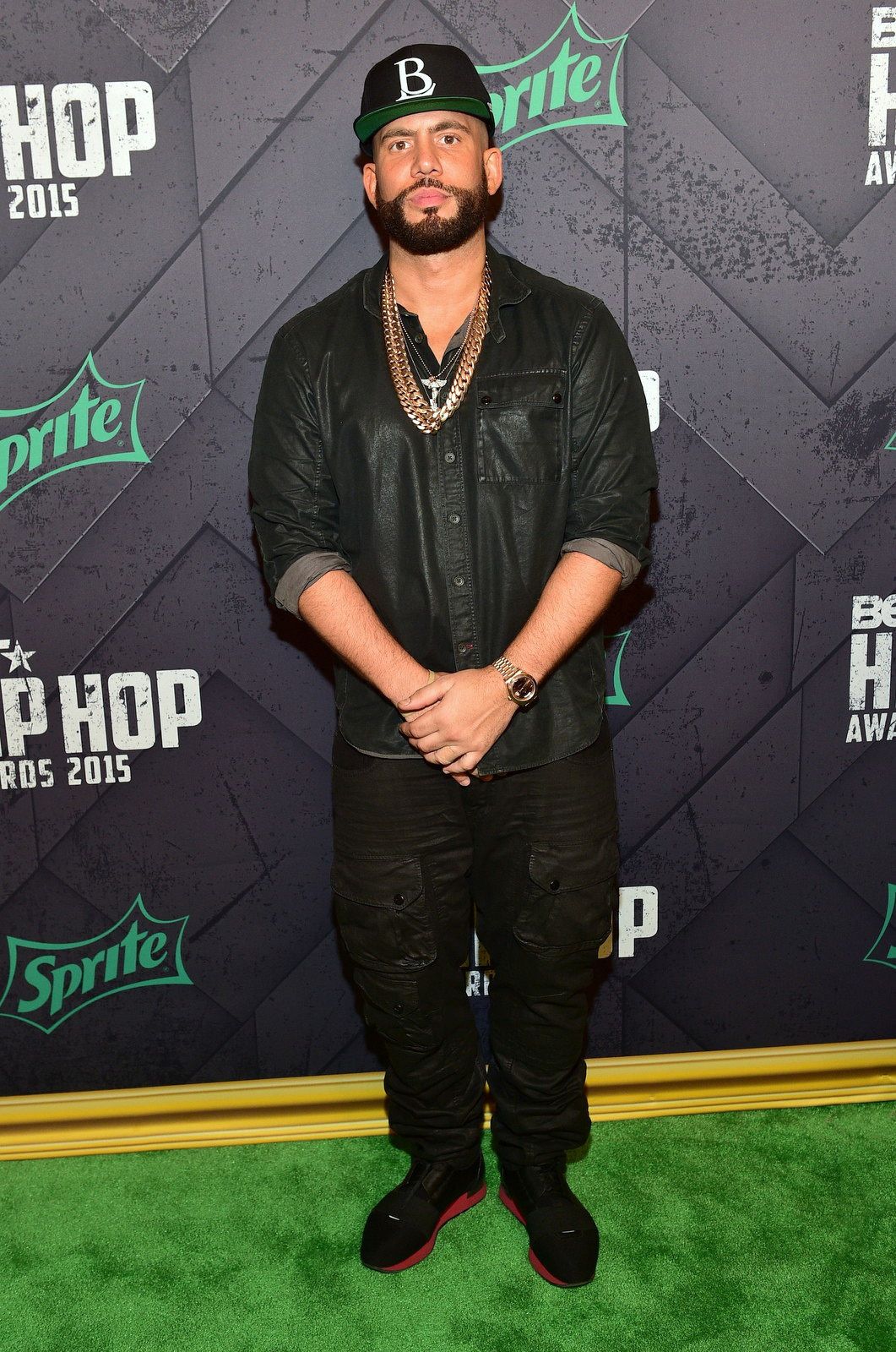 Men in Black - DJ Drama rocks all black from head to toe. His style is lowkey flossy! (Photo: Prince Williams/FilmMagic)