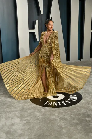 Tracee Ellis Ross&nbsp; - Tracee Ellis Ross twirls onto the carpet at the 2020 Vanity Fair Oscar Party. She looked like a goddess in a gold metallic gown by Zuhair Murad. (Photo: Frazer Harrison/Getty Images) (Photo: Frazer Harrison/Getty Images)