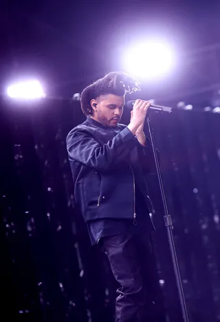 Weekend Behavior - The Weeknd closed out Day 2 with a crowd-pleasing cover of Beyoncé's&nbsp;&quot;Drunk in Love.&quot;&nbsp; (Photo: Christopher Polk/Getty Images)