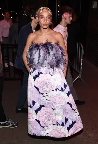 Adwoa Aboah - Model&nbsp;Adwoa Aboah&nbsp;looked feathery chic as she posed for the cameras wearing a strapless purple floral gown.(Photo: Daniel Zuchnik/GC Images)