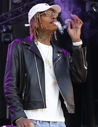 Wiz Khalifa - Wiz snuck in the back door and ripped the stage with Ty Dolla $ign as they gave the fans a taste of "We Dem Boyz" and "Or Nah."(Photo: WENN.com)