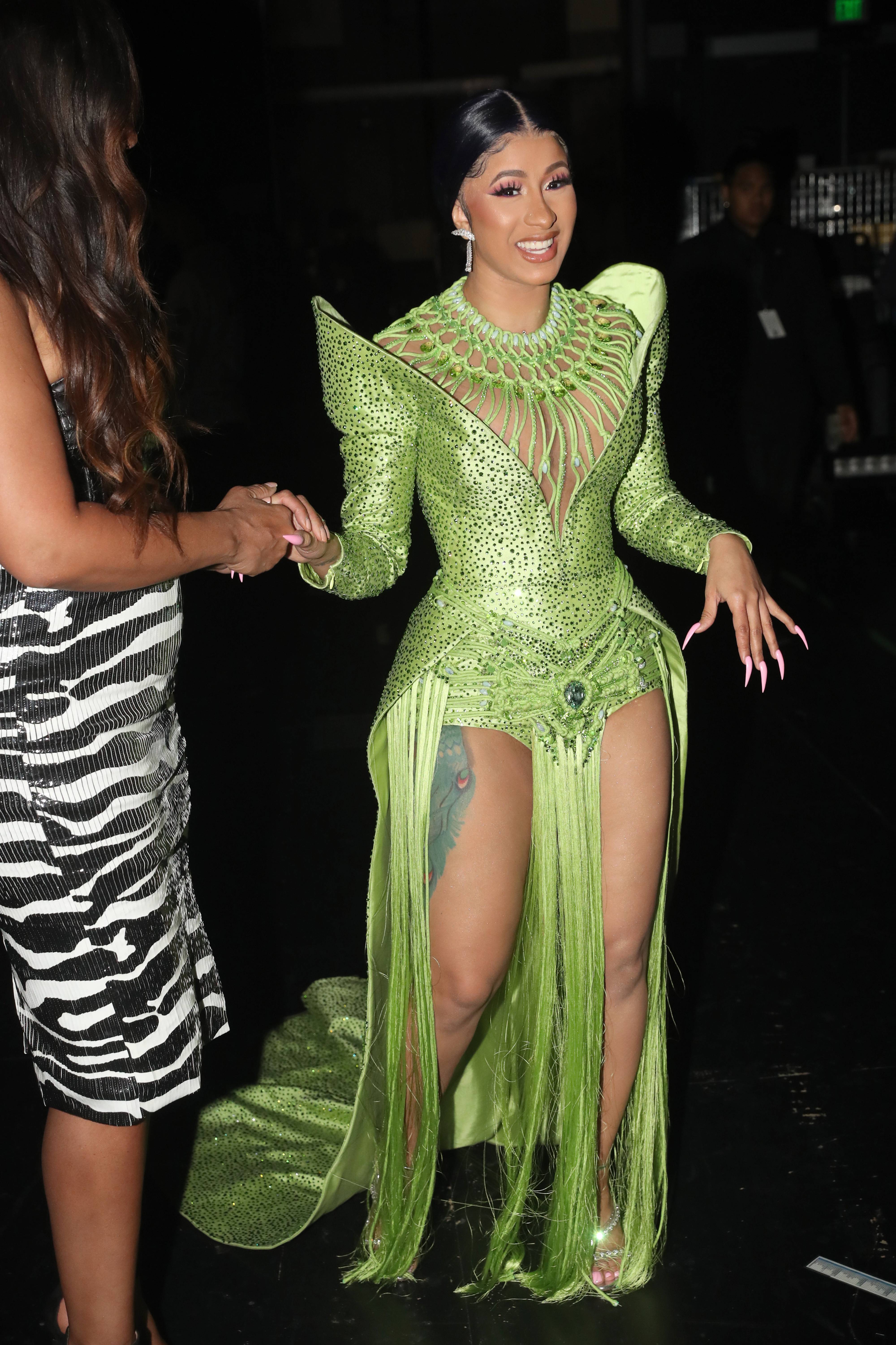 cardi b green dress Looking Like Schmoney!: Cardi B Switches Out of Green Chaps Into A Custom  Nicolas Jebran Gown | News