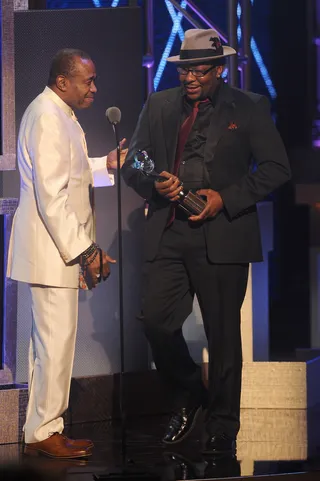 Inspirational Moments  - Actor Ben Vereen and New Edition frontman Bobby Brown present Usher with the award for Musical Arts.(Photo:Brad Barket/BET/Getty Images for BET)