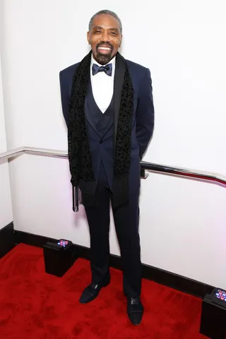 Broadcasting Style  - President of Broadcast Media Sales for BET Louis Carr takes to the carpet in his dashing suit. (Photo: Bennett Raglin/BET/Getty Images for BET)