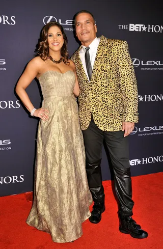 Living Life Like It's Golden  - Rachel Stuart and Executive Vice President and General Manager of CENTRIC&nbsp;Paxton Baker&nbsp;came on the carpet to give you a touch of gold. (Photo: Kris Connor/BET/Getty Images for BET)