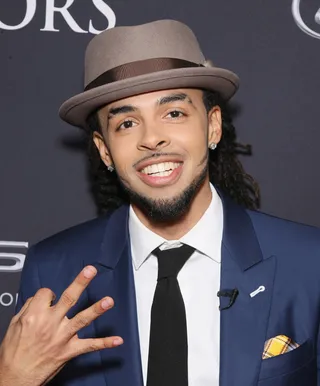 Dee-1 - Dee-1 mixed up his color palette&nbsp;and topped it off with this red carpet head gear.(Photo: Bennett Raglin/BET/Getty Images for BET)