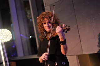 Play On - Miri Ben-Ari delights guests with a performance ahead of the star-studded 2015 BET Honors.(Photo: Kris Connor/BET/Getty Images for BET)