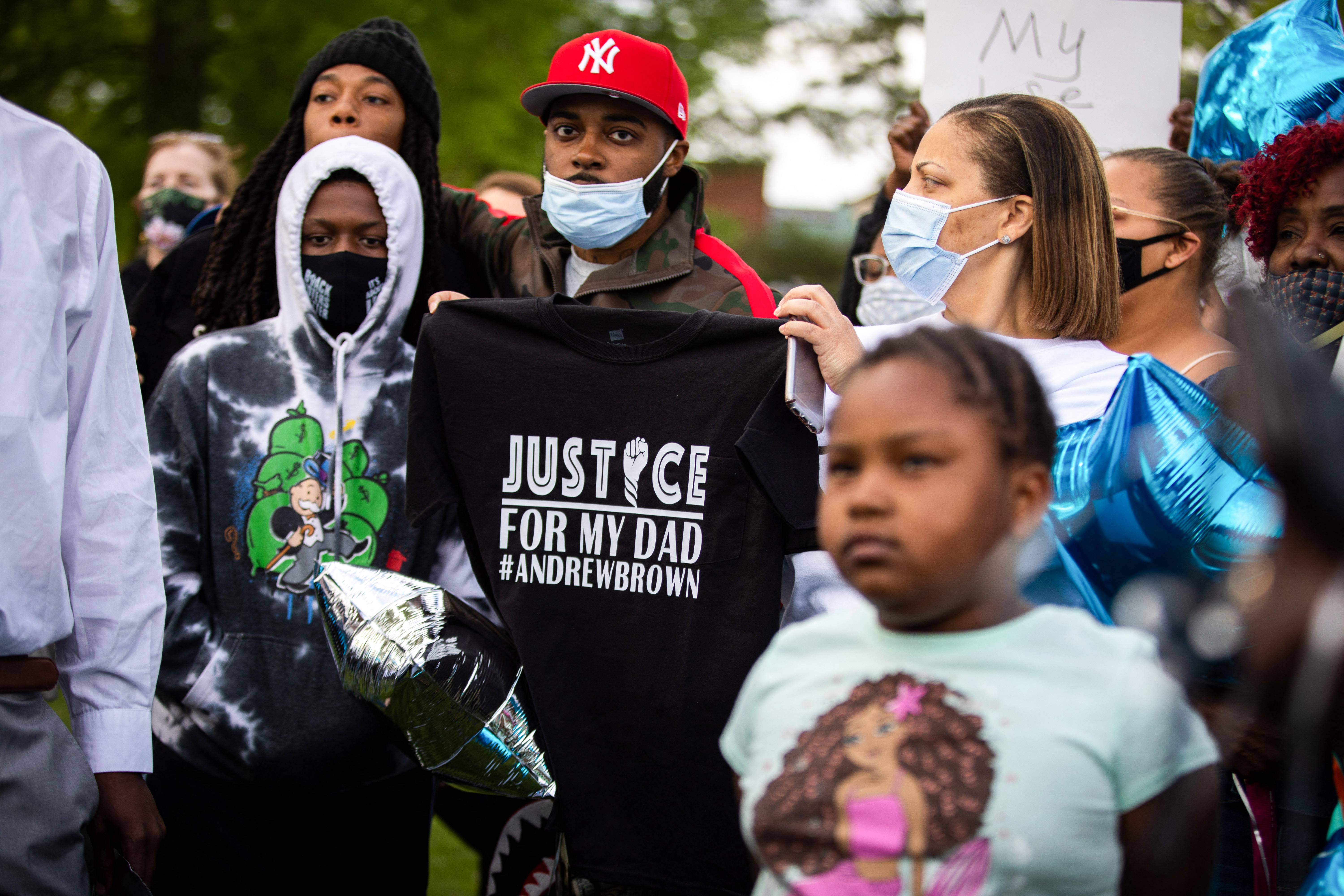 The family of Andrew Brown Jr. join demonstrators for a balloon release in his honor in Elizabeth City, North Carolina on April 23, 2021. - Eyewitnesses say that Brown Jr. was shot and killed by Pasquotank County Sheriff deputies as he was attempting to evade them while they were serving him a warrant. The department has released few details over the incident as members of the community plead for transparency and the release of body camera footage. (Photo by Logan Cyrus / AFP) (Photo by LOGAN CYRUS/AFP via Getty Images)