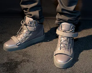Joyner Lucas - black&nbsp;Giuseppe Zanotti Plated-Strap Double-Zip Sneakers - Joyner Lucas had a crisp pair that matched his jeans.(Photo: Paras Griffin/BET/Getty Images for BET Networks)