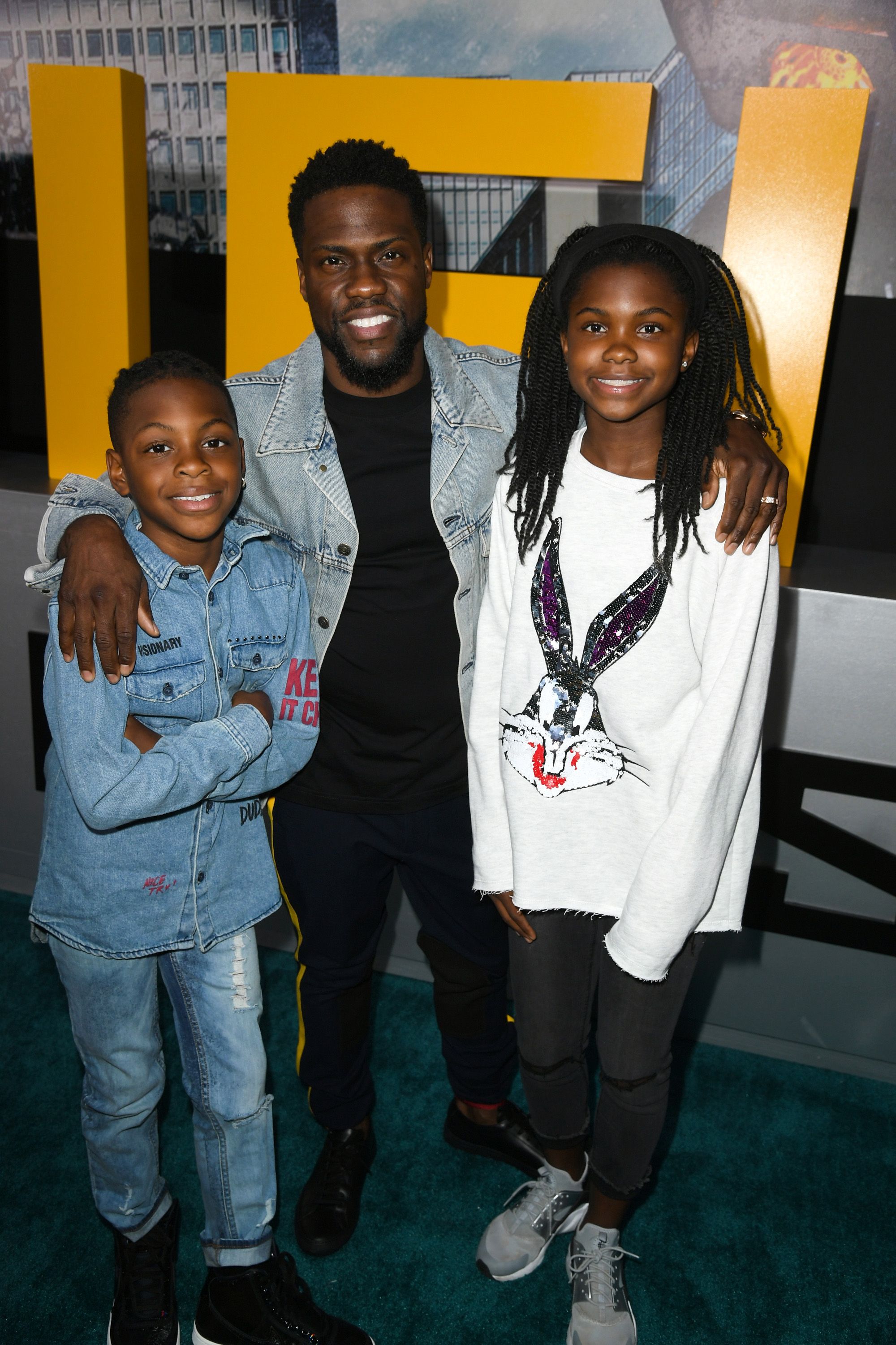 HOLLYWOOD, CA - MARCH 21:  Hendrix Hart, Kevin Hart and Heaven Hart attend Universal's "Pacific Rim Uprising" premiere  at TCL Chinese Theatre IMAX on March 21, 2018 in Hollywood, California.  (Photo by Kevin Winter/Getty Images)