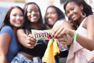 Fan Love&nbsp; - Fans display M&amp;M's during 106 &amp; Park Live sponsored by Denny's &amp; M&amp;M's. It's clear that M&amp;M's are their favorite type of candy.(Photo: Matt Winkelmeyer/Getty Images for BET)