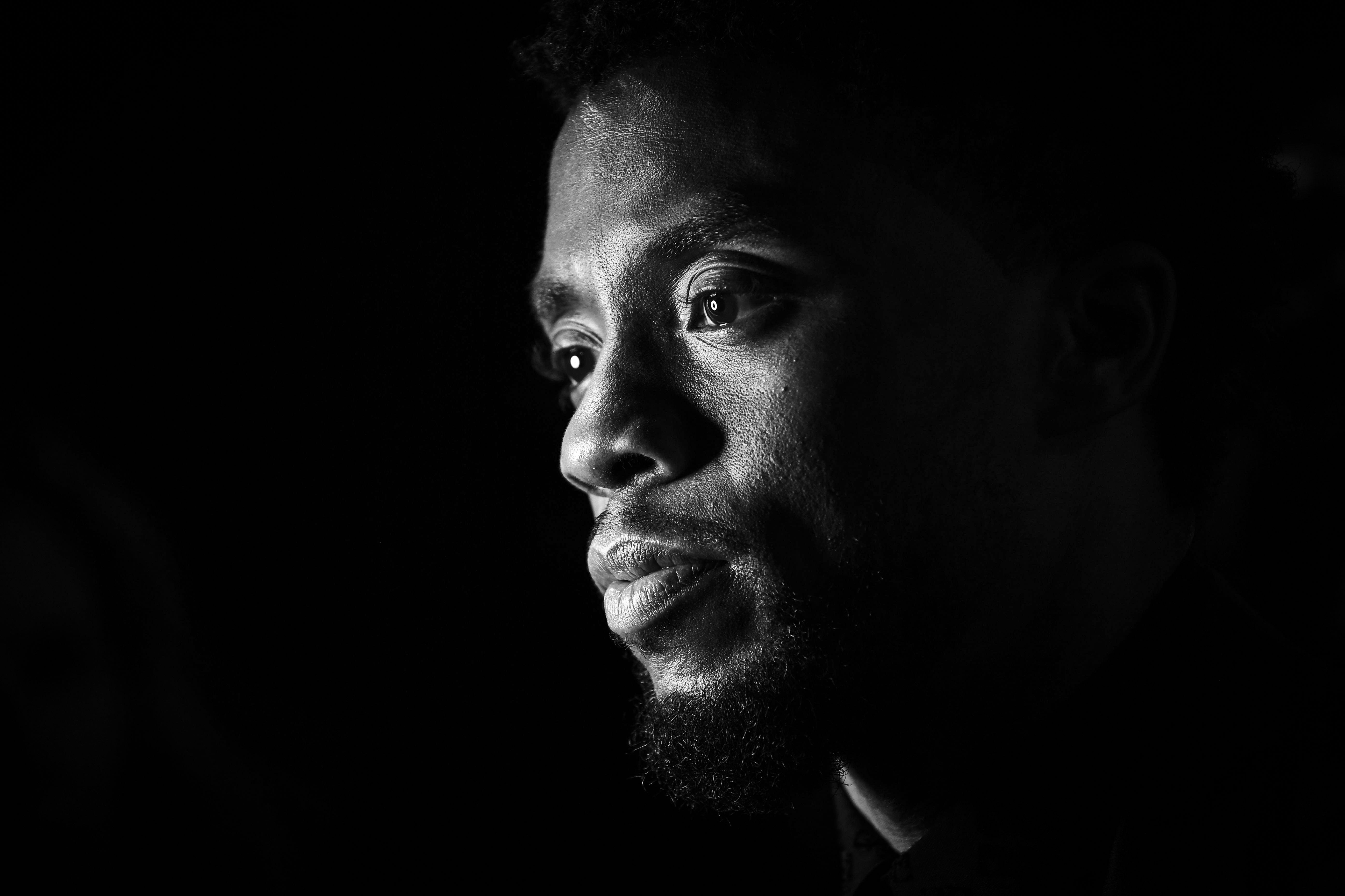 LONDON, ENGLAND - FEBRUARY 08:  (EDITORS NOTE: THIS IMAGE HAS BEEN CONVERTED TO BLACK AND WHITE) Chadwick Boseman attends the European Premiere of Marvel Studios' "Black Panther" at the Eventim Apollo, Hammersmith on February 8, 2018 in London, England.  (Photo by Gareth Cattermole/Getty Images for Disney)