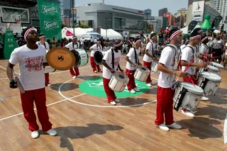 The Beat Goes On - Students from Compton's Centennial High School Drumline showed their skills during half time at the Sprite Celebrity Basketball Exhibition Game during the 2013 BET Experience at L.A. LIVE.(Photo: Ben Horton/Getty Images for BET)