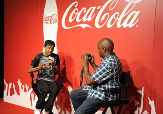 Close Up - Diggy gets ready to hit the set with a few last minute pics. (Photo: John Ricard / BET)