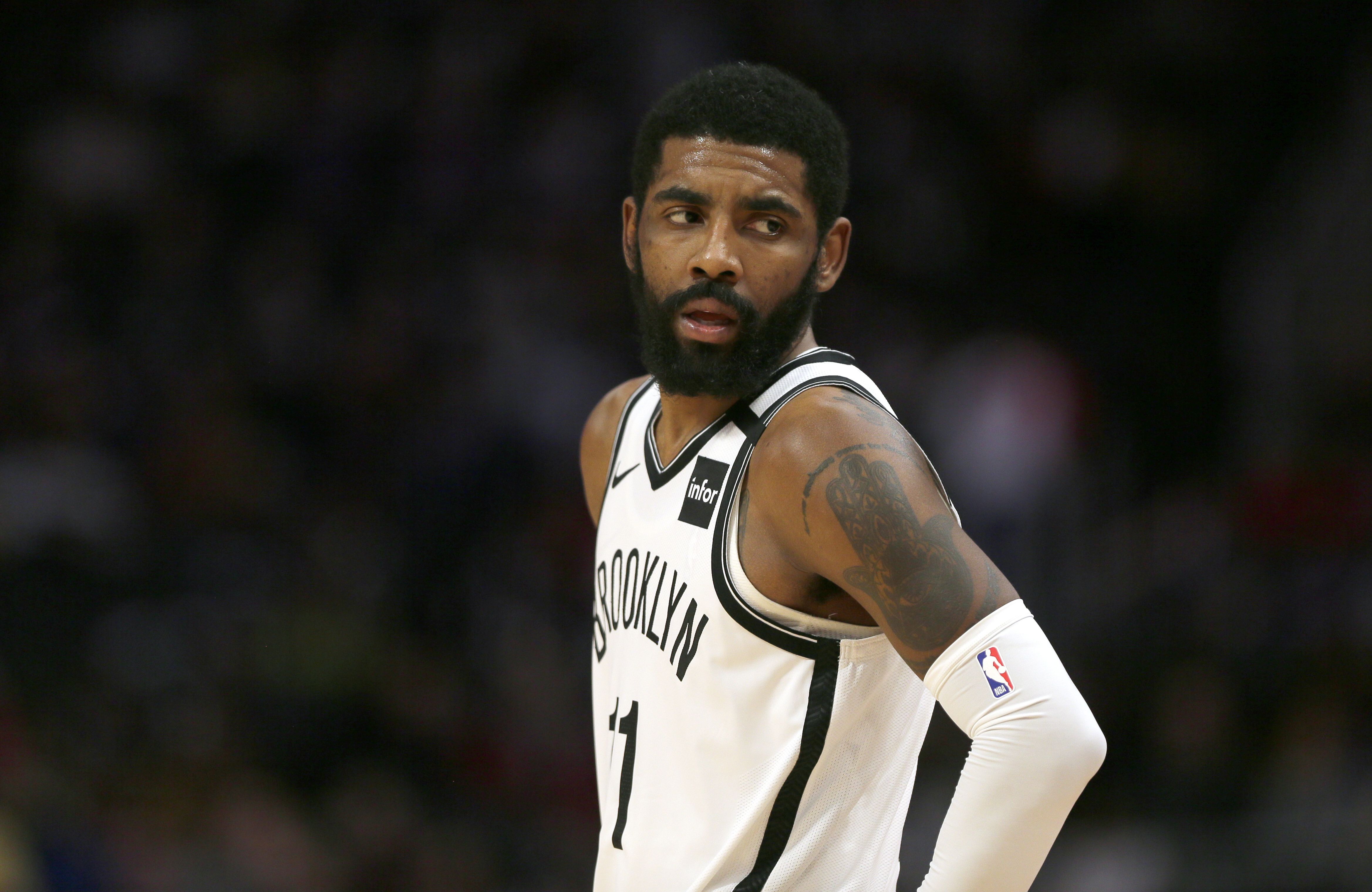 DETROIT, MI -  JANUARY 25:   Kyrie Irving #11 of the Brooklyn Nets during the first half of a game against the Detroit Pistons at Little Caesars Arena on January 25, 2020, in Detroit, Michigan.  NOTE TO USER: User expressly acknowledges and agrees that, by downloading and or using this photograph, User is consenting to the terms and conditions of the Getty Images License Agreement. (Photo by Duane Burleson/Getty Images)