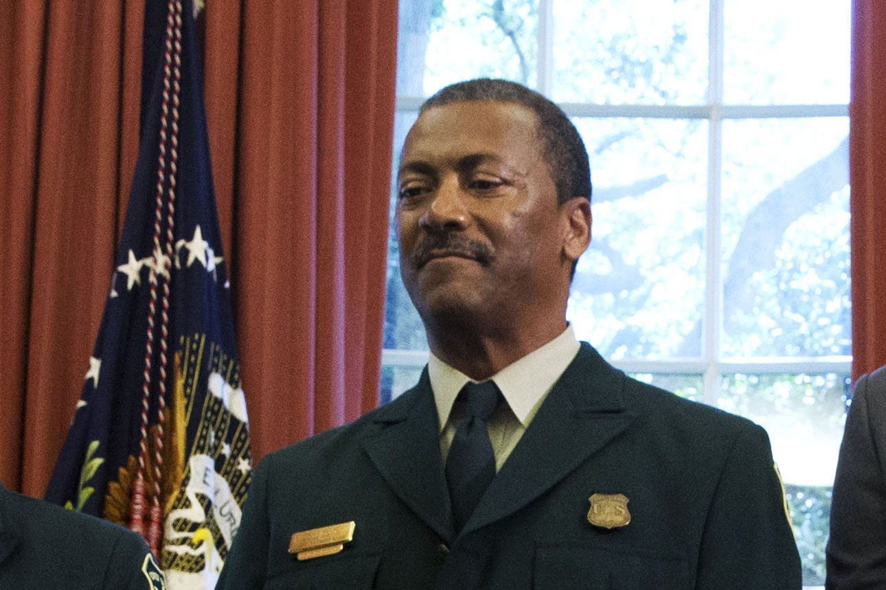 FILE - In this July 10, 2015, file photo Randy Moore, of the U.S. Forest Service, listens as President Barack Obama talks about the designation of three new national monuments in the Oval Office of the White House in Washington. Veteran forester Randy Moore has been named chief of the U.S. Forest Service, the first African American to lead the agency in its 116-year history. (AP Photo/Jacquelyn Martin, File)