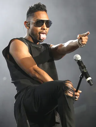 MIGUEL UNLIMITED - Miguel turned up the already-scorching heat at Staples. And his microphone got some serious one-on-one time.(Photo: Chelsea Lauren/Getty Images for BET)