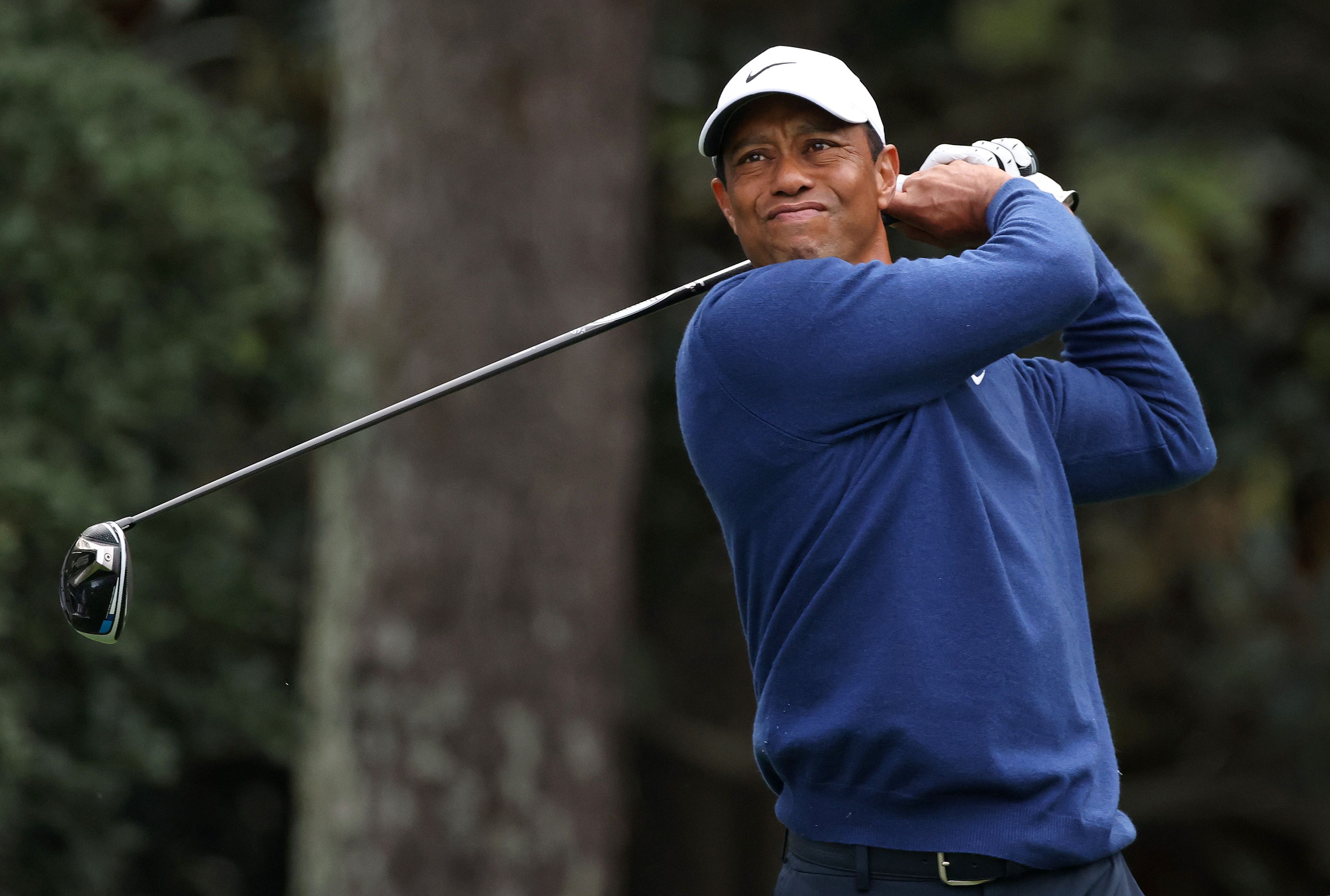 AUGUSTA, GEORGIA - NOVEMBER 14: Tiger Woods of the United States plays his shot from the 15th tee during the continuation of the second round of the Masters at Augusta National Golf Club on November 14, 2020 in Augusta, Georgia. (Photo by Rob Carr/Getty Images)