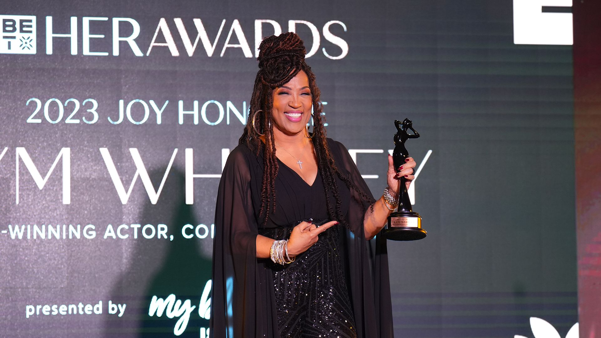 Actress Kym Whitley with the Joy 2023 Award