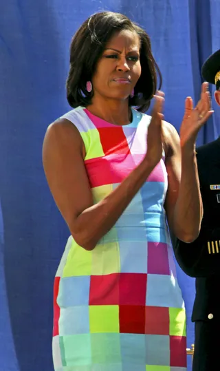 Michelle Obama - The first lady goes bold for spring in a Preen Spring 2012 checkered-print knee-length dress with saucy turquoise heels for an added color boost.   (Photo: Courtesy whithouse.gov)