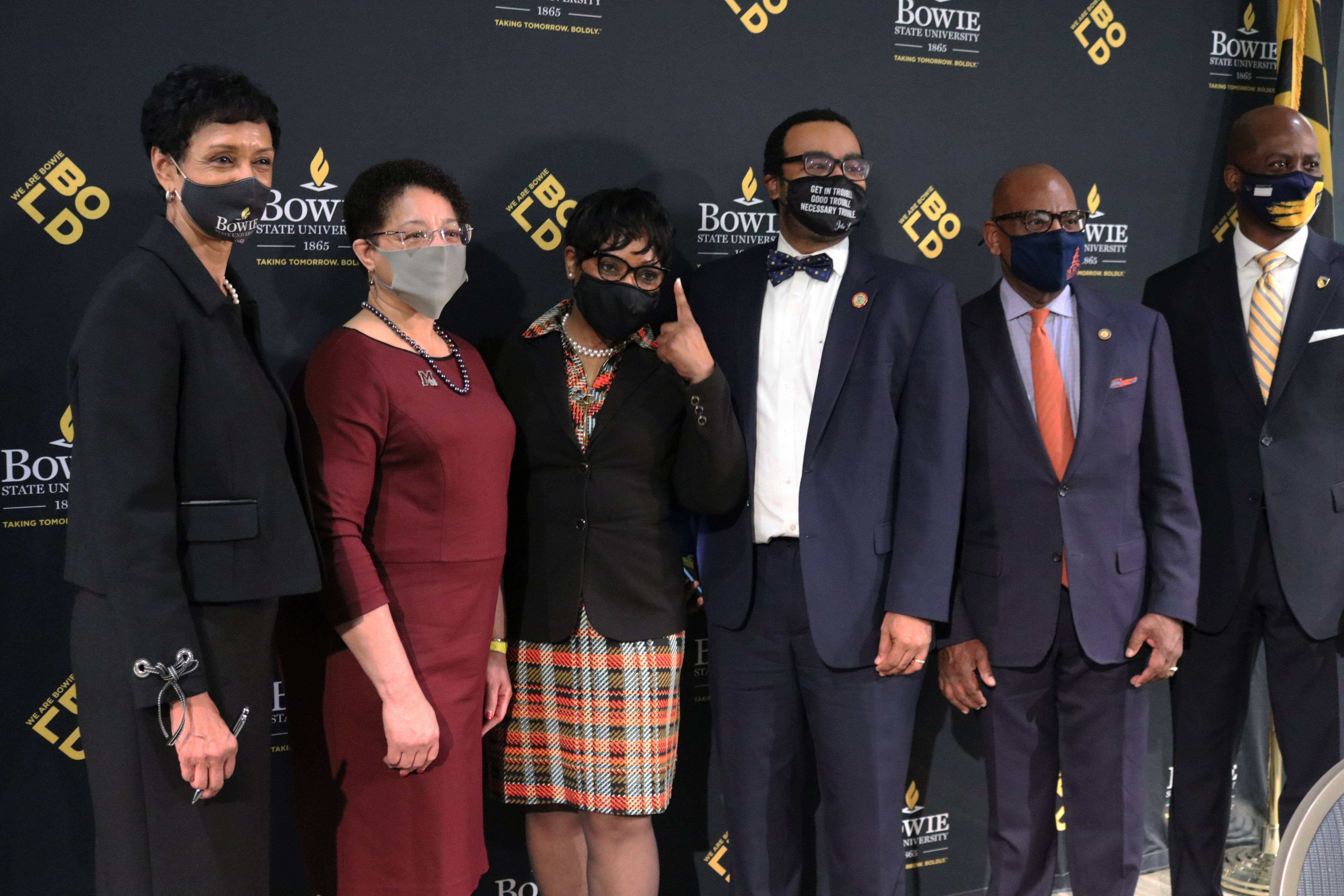 /// 


2 of 2 for Maryland HBCUs-Settlement. Cutline: Maryland House Speaker Adrienne Jones, third from left, points up while standing with the presidents of Maryland’s four historically Black colleges and universities after a bill signing ceremony on Wednesday, March 24, 2021 in Bowie, Maryland, to set aside $577 million over a decade to settle a federal lawsuit over underfunding at the state’s HBCU’s. From left: Aminta Breaux, president of Bowie State University, Heidi Anderson, president of the University of Maryland Eastern Shore, Jones, Sen. Charles Sydnor, David Wilson, president of Morgan State University, and Anthony Jenkins, president of Coppin State University. By Brian Witte.



Brian Witte

Annapolis Correspondent

The Associated Press

Office: (410) 269-0196

Cell: 410-271-4054

Twitter: @APBrianWitte