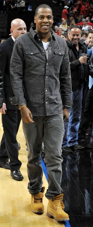 An Arena for Kings - Rapper Jay-Z shows off a proud smile at the Kentucky Wildcats and Maryland Terrapins game during the Barclays Center Classic at the Barclays Center in Brooklyn.(Photo: Jason Szenes/Getty Images)