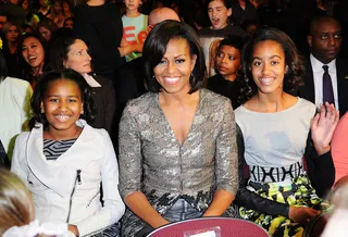 Ladies First - First Lady Michelle Obama hit the Kids' Choice Awards with beautiful daughters Sasha and Malia.   (Photo: Kevork Djansezian/Getty Images)