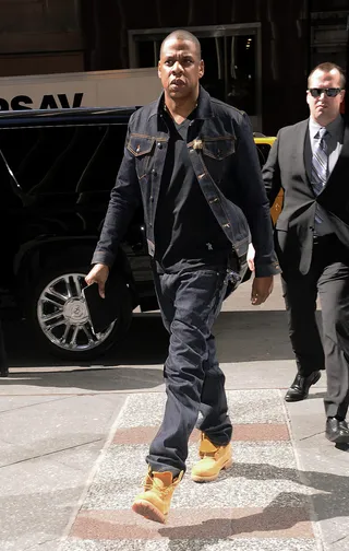 iMogul - New dad Jay Z hurries out of his Midtown Manhattan office building carrying an iPad. Wonder if Jigga-man is on call for daddy duty?    (Photo: PacificCoastNews.com)