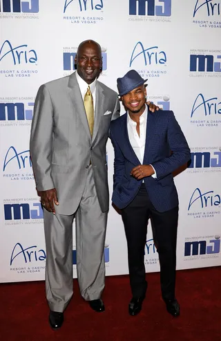 Vegas, Baby! Vegas! - Basketball great and Charlotte Bobcats owner Michael Jordan and recording artist Ne-Yo arrive at the 11th annual Michael Jordan Celebrity Invitational gala at the Aria Resort &amp; Casino at CityCenter in Las Vegas. (Photo: Ethan Miller/Getty Images)