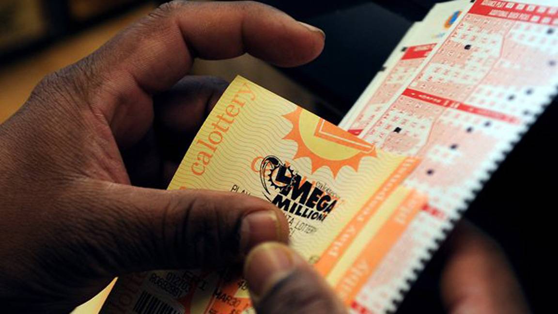 Lottery Mania Strikes&nbsp; - The Mega Millions jackpot swelled to a world-record $640 million Friday, igniting a ticket-buying frenzy among Americans across the country.(Photo: Courtesy ERIC PAUL ZAMORA/THE FRESNO BEE/Megamillions.com)