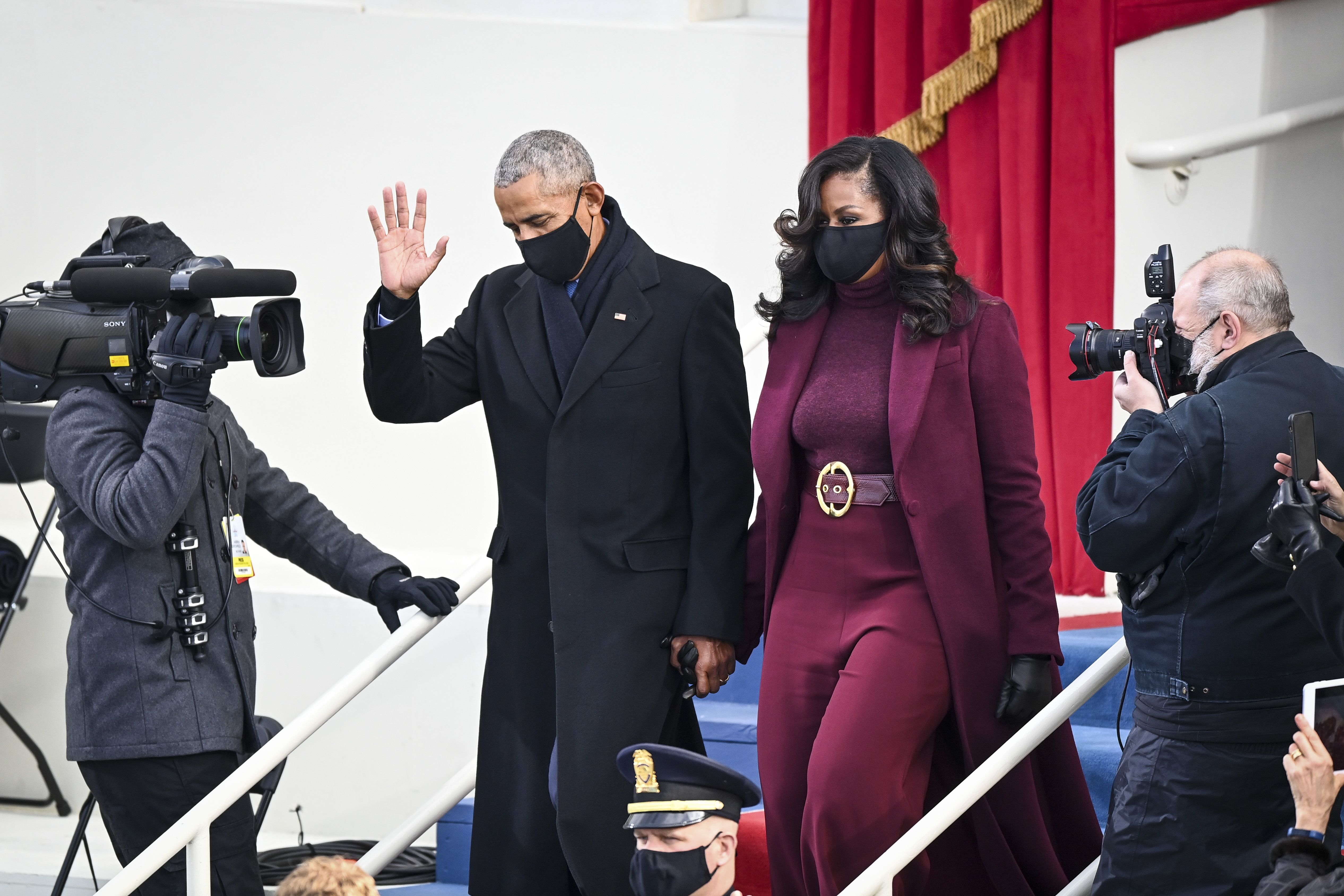 WASHINGTON, DC - JANUARY 20: Barack and Michelle Obama arrive before Joe Biden is sworn in as 46th President of the United States on January 20, 2021 in Washington, DC. (Photo by Jonathan Newton/The Washington Post via Getty Images)