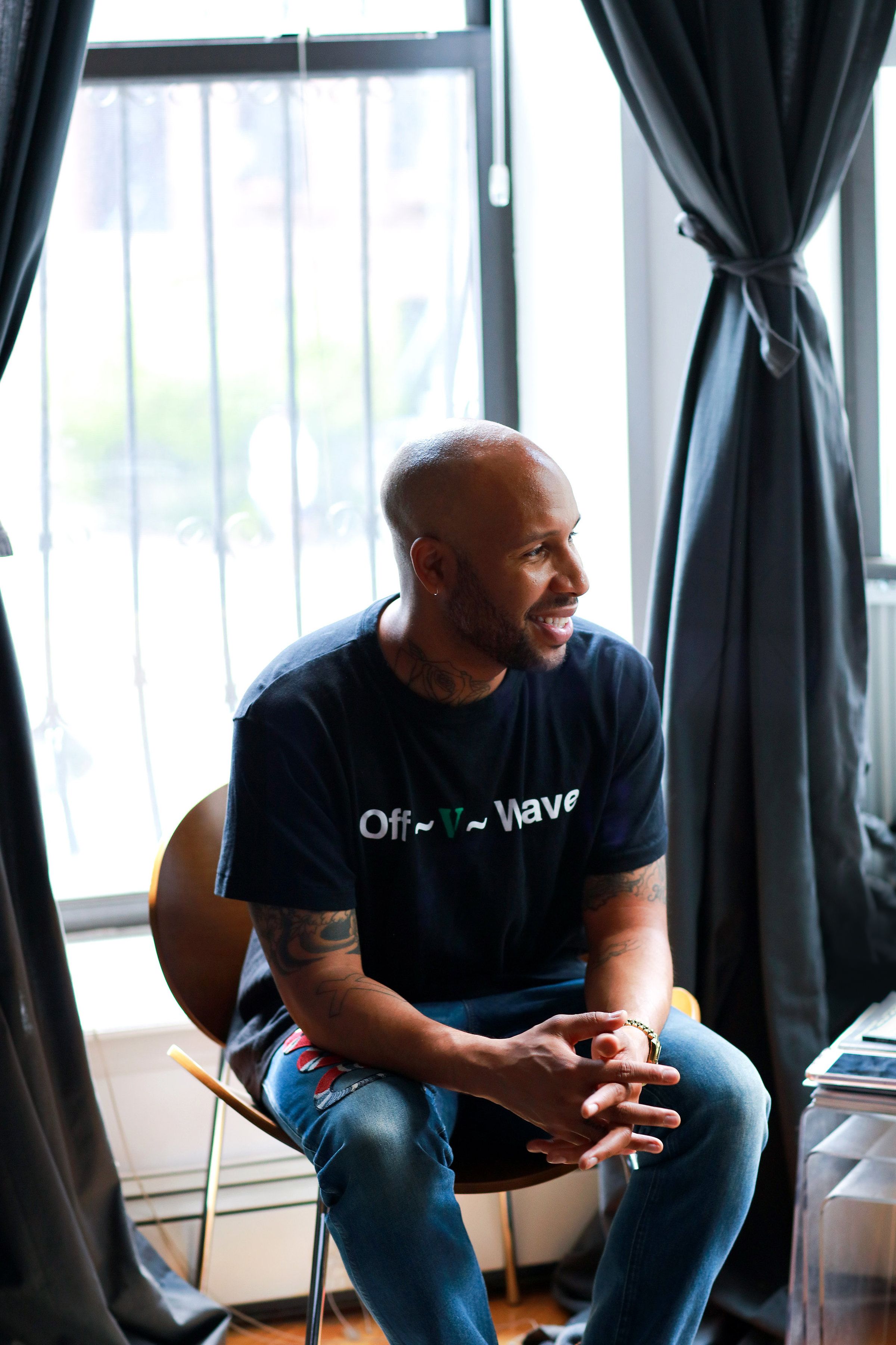 "Take something you wouldn’t expect pairing. For example these (Gucci jeans) that I have on, they’re plain-washed blue jeans that Gucci has taken and decked out with the most beautiful embroidery and pairing them with a track top, that’s completely my vibe. Even plain jeans with a white tee when you’re on the go, that’s me too. I like to be able to have the option to keep it crazy, or go simple." - (Photo: Meredith Andrews)