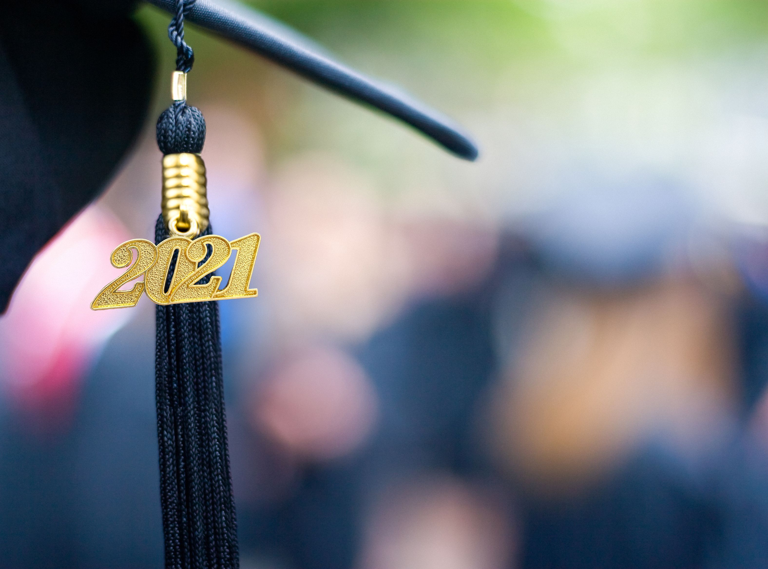 Closeup of a 2021 Graduation Tassel at a graduation ceremony.