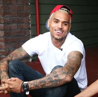 Chris Brown @chrisbrown - Tweet: "I'm an artist and this is art. Dia de los Muertos."Chris Brown explains where he got the inspiration for his new neck tattoo that raised many eyebrows this week.&nbsp;(Photo: Maury Phillips/WireImage)