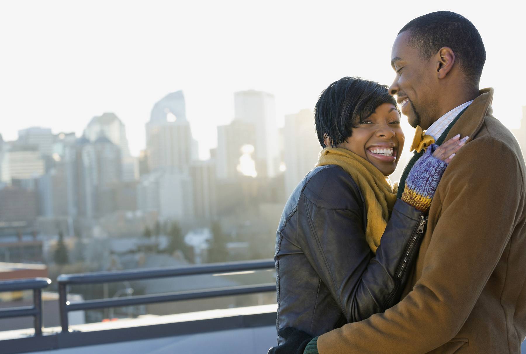 1. Take a Cuddle Break - Most likely, the drive will be tiresome on both of you, no matter who's driving the most. As you pass through some cool destinations, it wouldn't hurt to take a cuddle break. Plus, it'll help you all remember why you made the trip in the first place. (Photo: Hero Images/Getty Images)