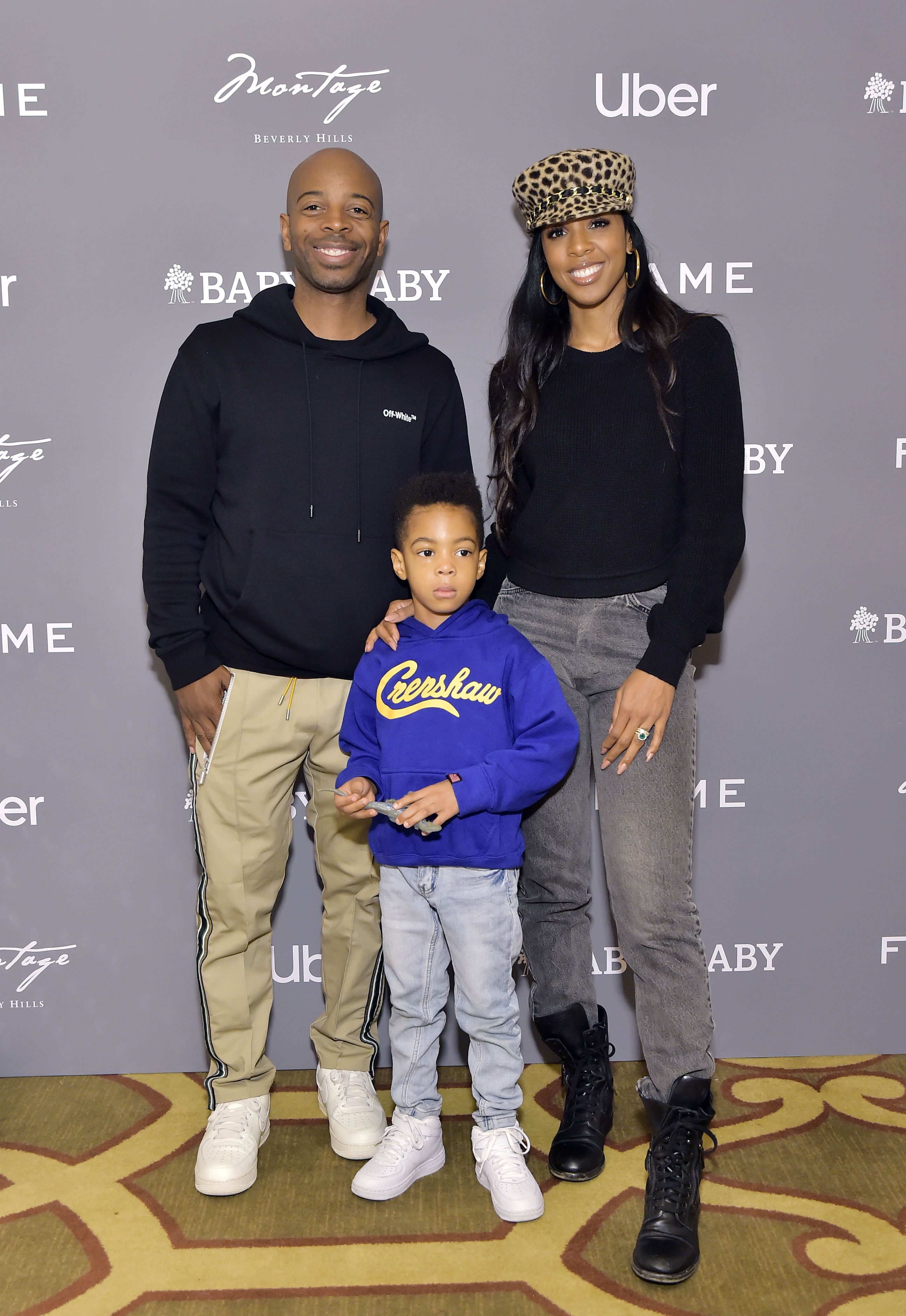BEVERLY HILLS, CALIFORNIA - DECEMBER 15: (L-R) Tim Weatherspoon, Titan Jewell Weatherspoon and Kelly Rowland attend The Baby2Baby Holiday Party Presented By FRAME And Uber at Montage Beverly Hills on December 15, 2019 in Beverly Hills, California. (Photo by Stefanie Keenan/Getty Images for Baby2Baby)