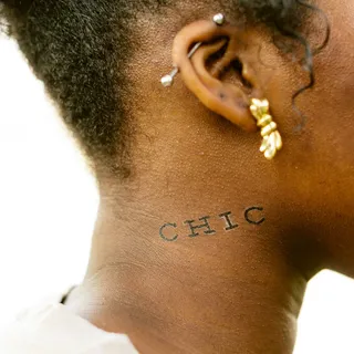 Spell It Out - Why not give your temporary tattoo a personalized touch? This version in the “Deming” font can be purchased at&nbsp;tattly.com. You get two sheets of characters to spell out your unique message to the world. (Photo: MIKE FORTRESS via Tattly)