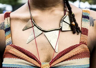 Make a Statement - Keep all eyes on your fabulous&nbsp;décolletage by decorating it&nbsp;in a tribal necklace. (Photo: Krista Schlueter / BET)