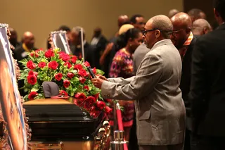 Spike Lee Pays Respect&nbsp; - Spike Lee takes a picture of a black St. Louis Cardinals baseball cap on top of Michael Brown's casket.&nbsp;(Photo: AP Photo/St. Louis Post Dispatch, Robert Cohen, Pool)