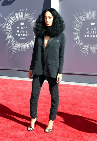 Solange Knowles - The fashion-forward singer channels Diana Ross in a sparkling blazer and matching cigarette pants. (Photo: Frazer Harrison/Getty Images)