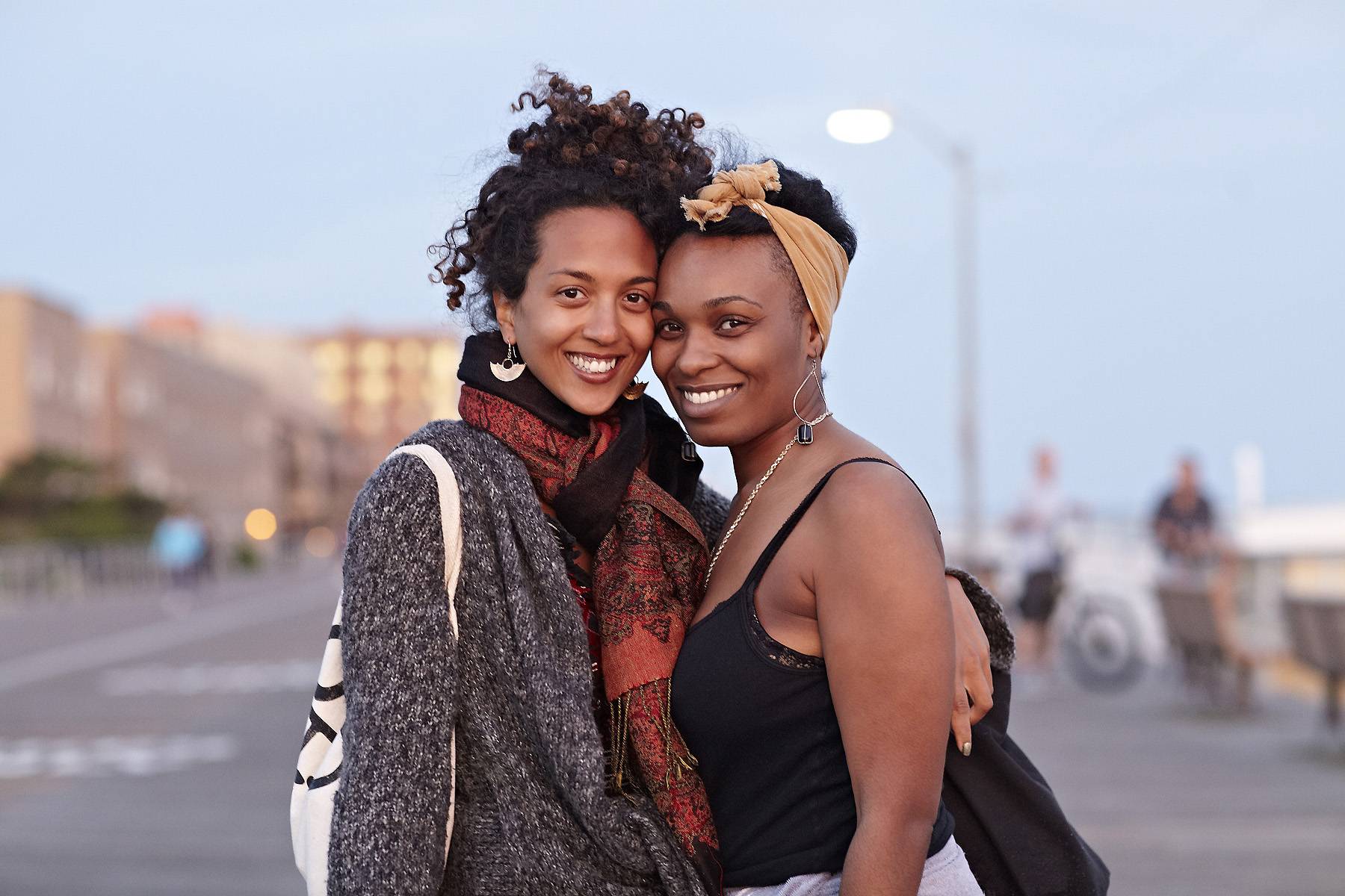 two happy women hugging