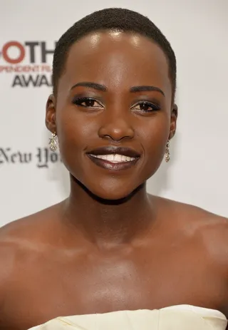 Lupita Nyong’o  - The 12 Years a Slave star amps up her beauty look with a sexy dark lip. Take note and let your next poppin' lip color stand out as your main accessory.  (Photo:&nbsp;Theo Wargo/Getty Images for IFP)