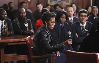Cape Town University - Obama meets with students after her speech.(Photo: AP Photo/Charles Dharapak, Pool)