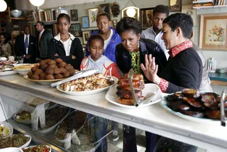 Lunch Stop - The Obamas made an unscheduled stop for lunch at Karen Dudley's restaurant The Kitchen.(Photo: AP Photo/Charles Dharapak, Pool)