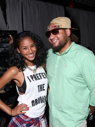 Happy Hosts - Model Celeste Seda looks stunning in a casual look as she strikes a pose with co-host Buttah Man backstage.(Photo: Bennett Raglin/BET/Getty Images for BET)